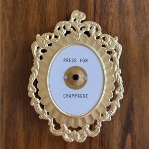 Gold Decorative Wall Button - Press for Champagne